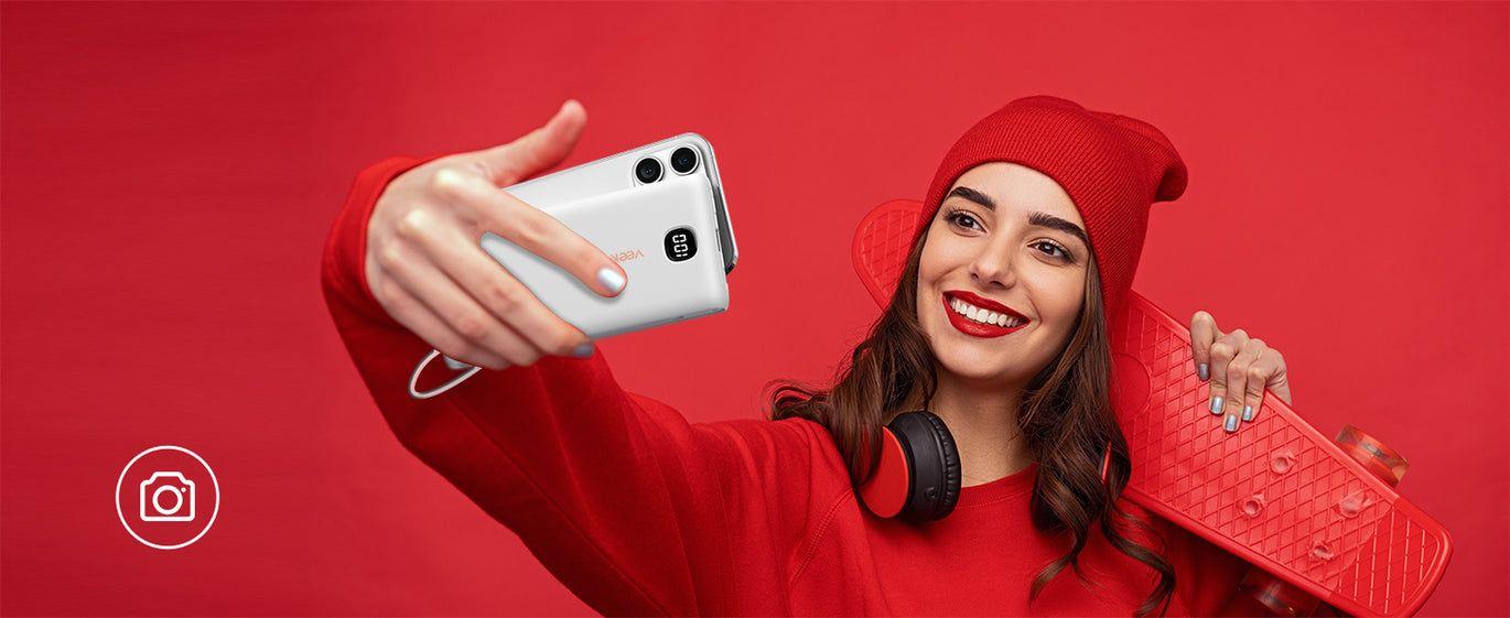 VEEKTOMX 10000mAh portable charger with built-in AC plug and multiple outputs – battery bank on plane travel.