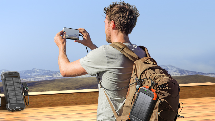 BLAVOR 10000mAh solar phone charger – rugged waterproof power bank with Qi wireless charging and dual flashlights for outdoor travel.