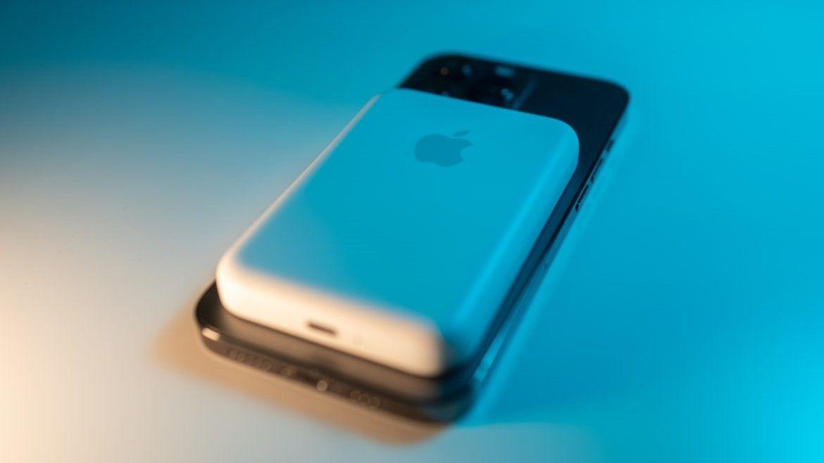 MagSafe portable charger attached to iPhone – best power bank for airplane travel in 2025, TSA-approved 5000mAh wireless charging solution.